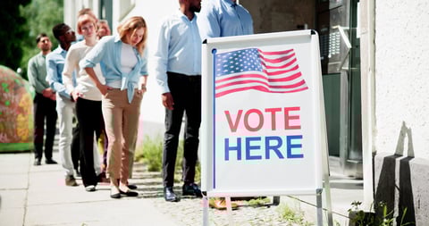 Diverse people at voting booth